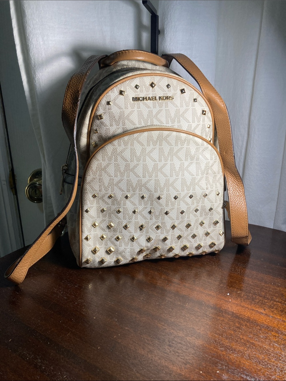 Michael Kors Cream and Tan MK Logo Studded Abbey Medium Backpack - Picture 1 of 12